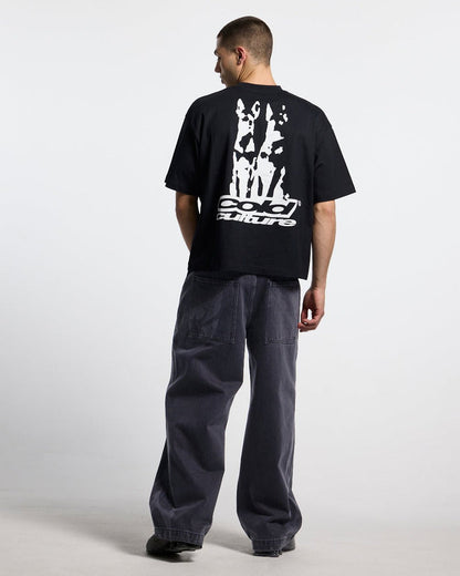 NEOTRIBAL V2 PANTS WASHED BLACK - washed black tribal print pants, back view on male model - Cold Culture #man