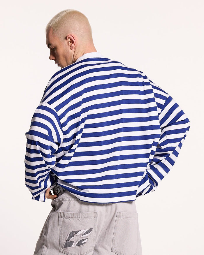 PARDON ME LONGSLEEVE WHITE & NAVY - navy striped longsleeve tee, back view on male model - Cold Culture #man