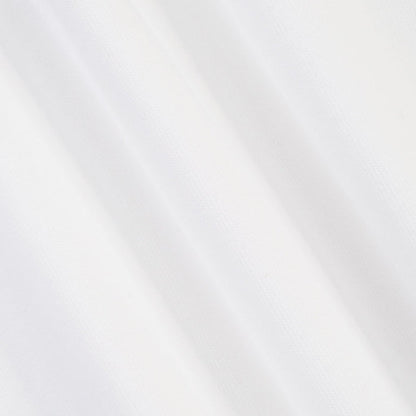 A close-up of a white textured fabric with soft diagonal folds and a fine woven pattern.