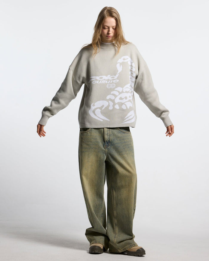 POISON KNIT COOL GREY - light grey scorpion knit sweater, front view on female model - Cold Culture #woman