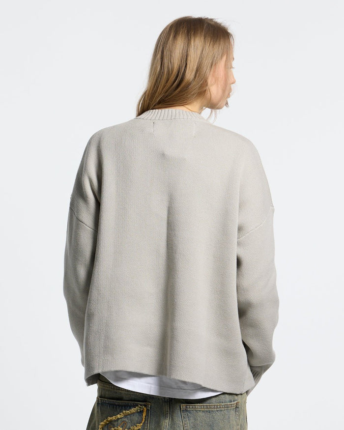 POISON KNIT COOL GREY - light grey scorpion knit sweater, back view on female model - Cold Culture #woman