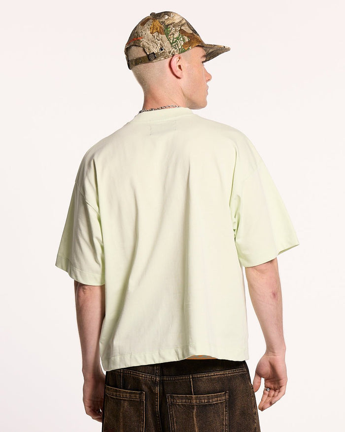 RELENTLESS TEE LIME - lime graphic print tee, back view on male model - Cold Culture #man