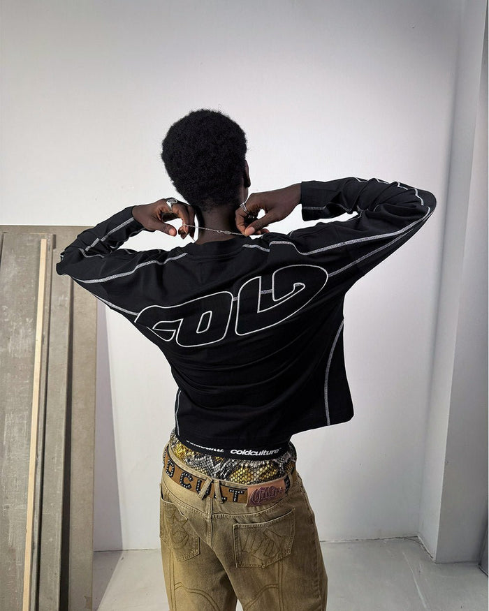 ROLLER LONGSLEEVE TEE BLACK - black oversized longsleeve tee, back view on male model - Cold Culture