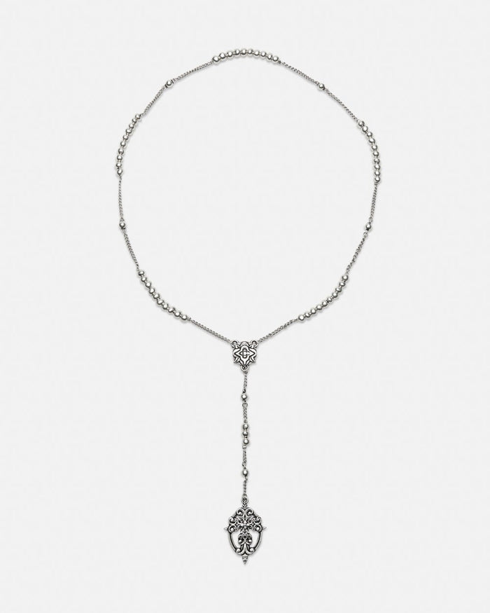 ROSARY NECKLACE - silver rosary necklace, flat lay - Cold Culture