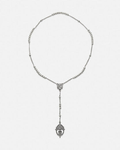 ROSARY NECKLACE - silver rosary necklace, flat lay - Cold Culture