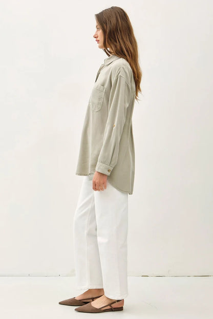 collared button down top with high low hem