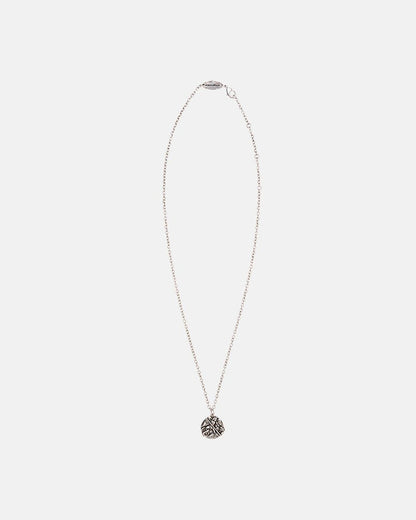 SAINT NECKLACE - silver saint medallion necklace, flat lay - Cold Culture