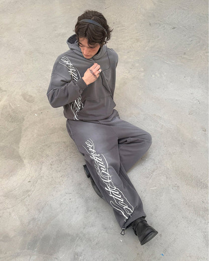 SCRIPT HOODIE ANTRACITE GREY - grey script print hoodie, street style shot - Cold Culture