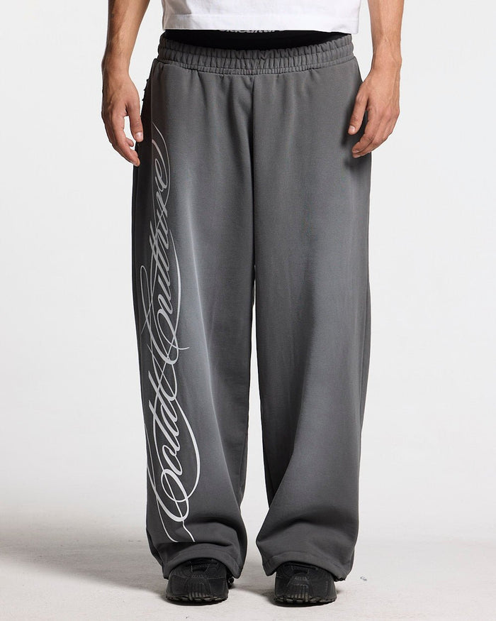 SCRIPT SWEATPANTS ANTRACITE GREY - dark grey script print sweatpants, front view on male model - Cold Culture