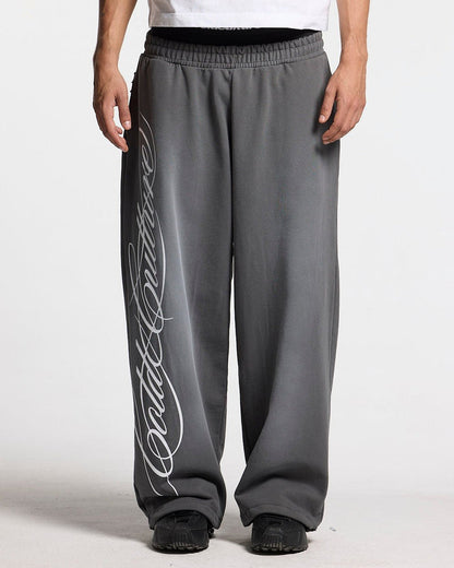 SCRIPT SWEATPANTS ANTRACITE GREY - dark grey script print sweatpants, front view on male model - Cold Culture