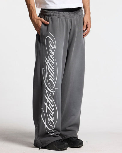 SCRIPT SWEATPANTS ANTRACITE GREY - dark grey script print sweatpants, front view on male model - Cold Culture