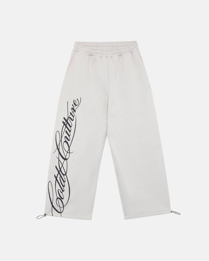 SCRIPT SWEATPANTS LIGHT GREY - light grey script print sweatpants, front view - Cold Culture