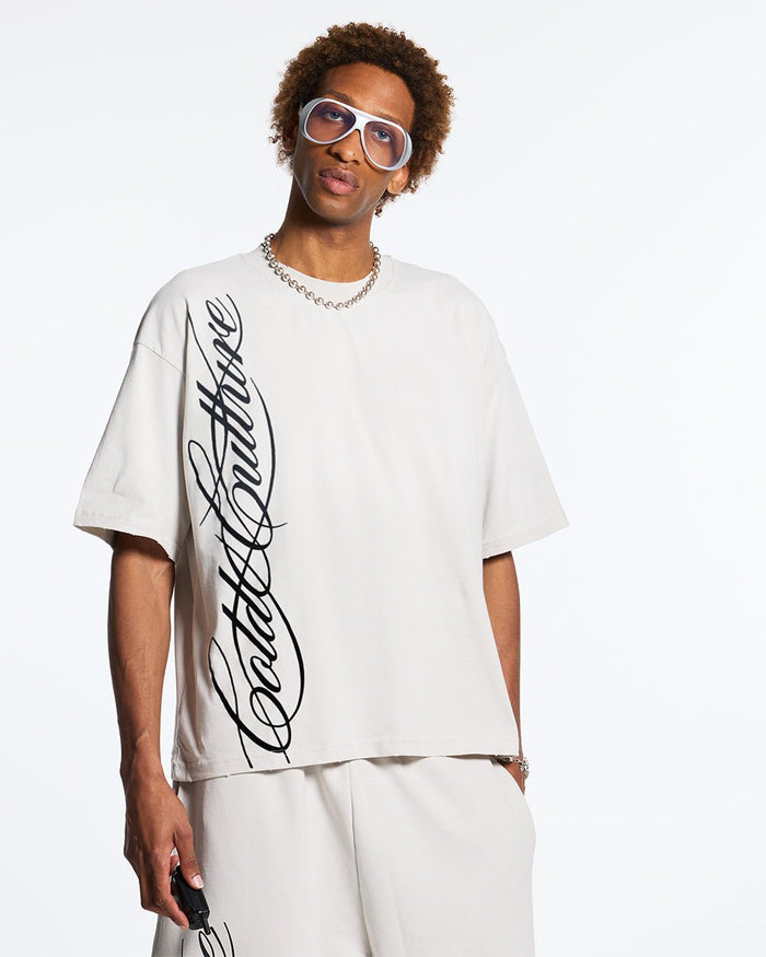 SCRIPT TEE LIGHT GREY - light grey script print tee, front view on male model - Cold Culture #man