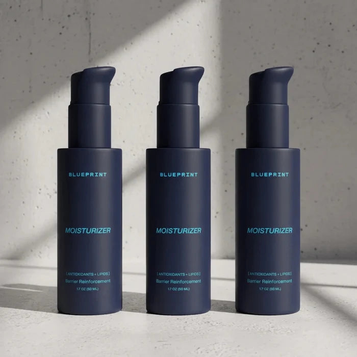 Three bottles of Blueprint Moisturizer from the longevity skincare line