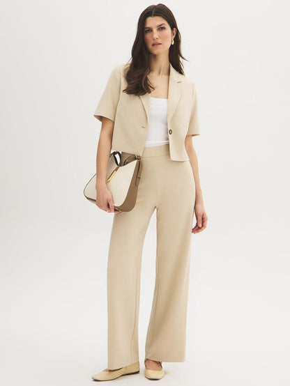 Dark Sapphire Cropped Short Sleeve Blazer - Woman Wearing Fitted Blazer with Notch Collar - Suzy Shier