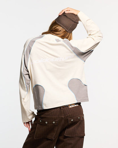 SLIDER LONGSLEEVE TEE GREY - grey panelled longsleeve tee, back view on female model - Cold Culture #woman