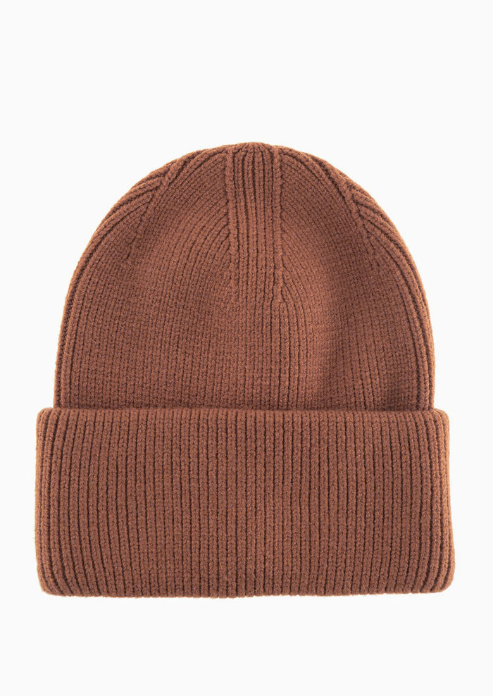 A knit beanie with oversized cuff in chestnut brown.