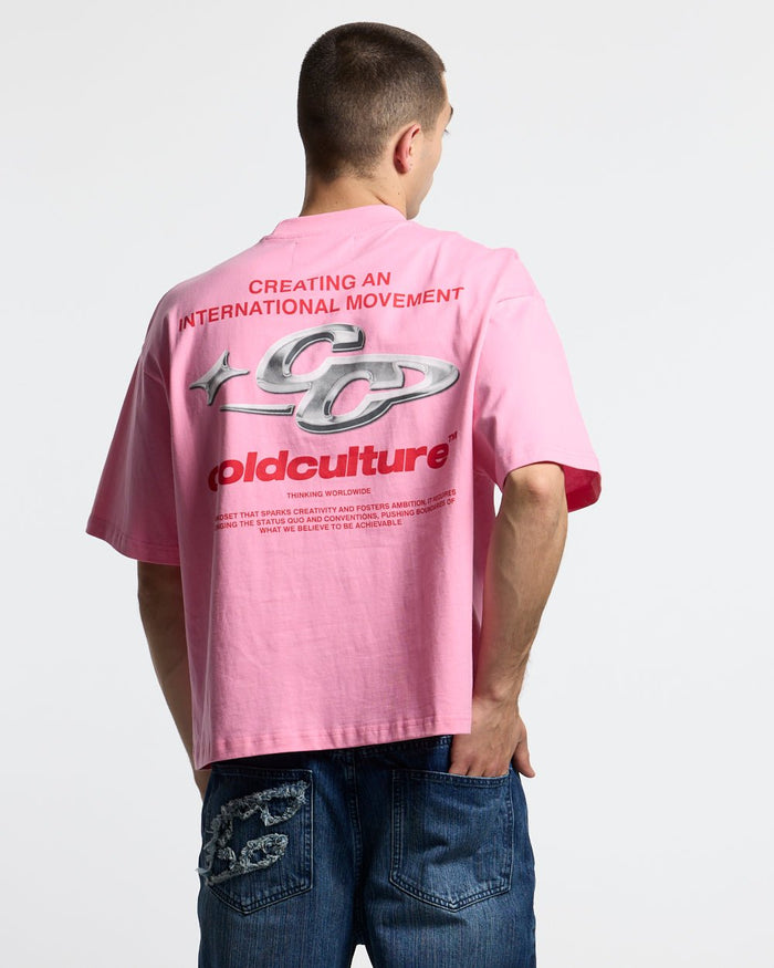 SPARKLY TEE PINK - pink graphic print tee, back view on male model - Cold Culture #man