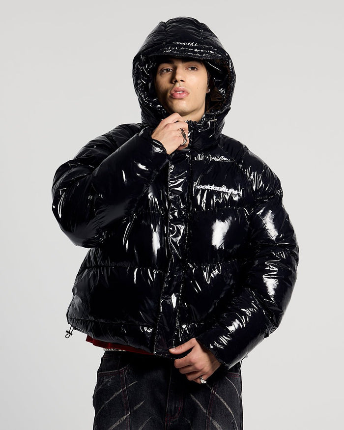 SPIRAL PUFFER GLOSSY BLACK - glossy black puffer jacket, front view on male model - Cold Culture #man