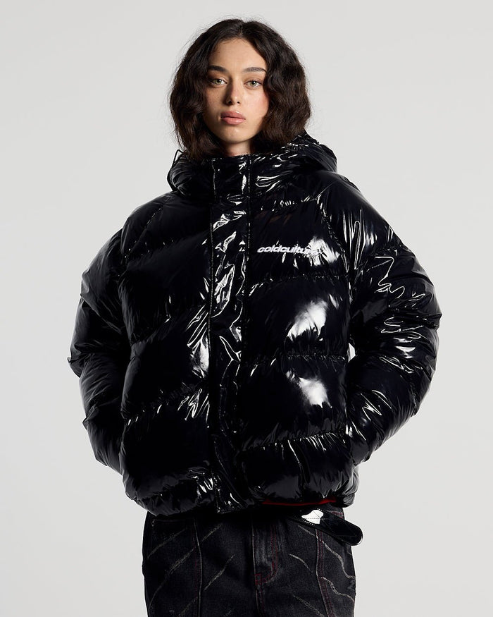 SPIRAL PUFFER GLOSSY BLACK - glossy black puffer jacket, front view on female model - Cold Culture #woman