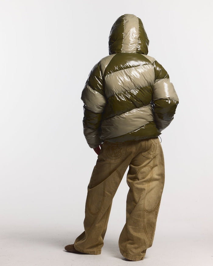 SPIRAL PUFFER GLOSSY GREEN MIX - green striped puffer jacket, back view on female model - Cold Culture #woman
