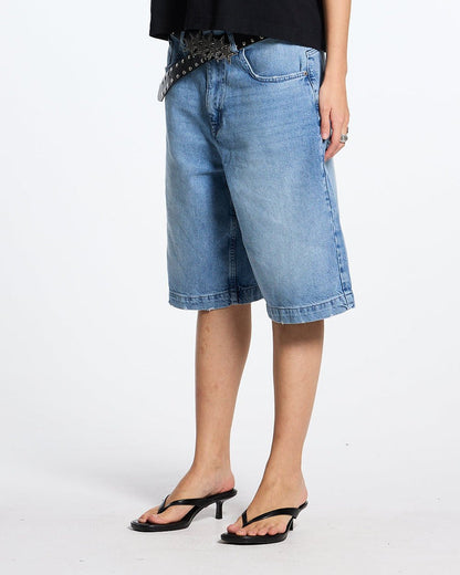 WIND SHORTS MARINE BLUE - light blue denim shorts, front view on female model - Cold Culture #woman
