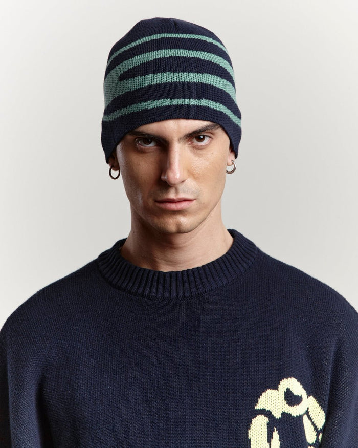 WORK BEANIE HEAVY BLUE - navy blue striped knit beanie, front view on male model - Cold Culture #man