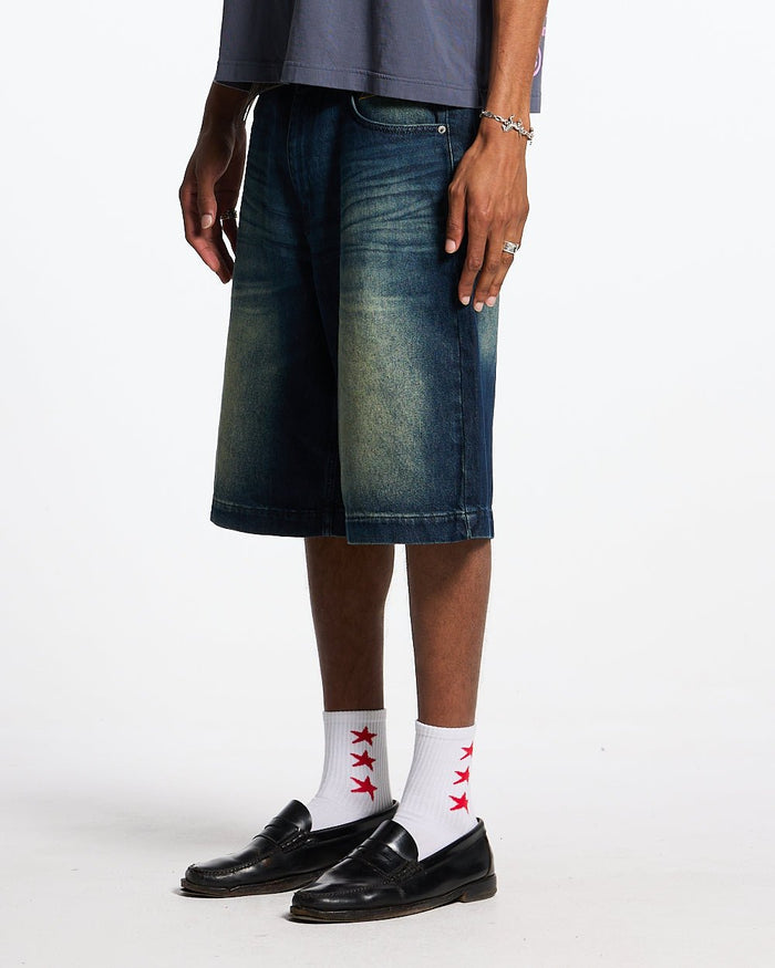 ZENIT SHORTS RAW - dark washed denim shorts, front view on male model - Cold Culture #man